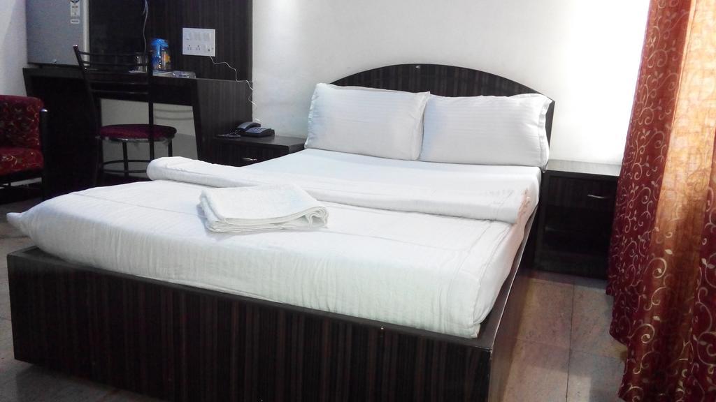 Hotel Richmond Residency Μπανγκαλόρ Δωμάτιο φωτογραφία